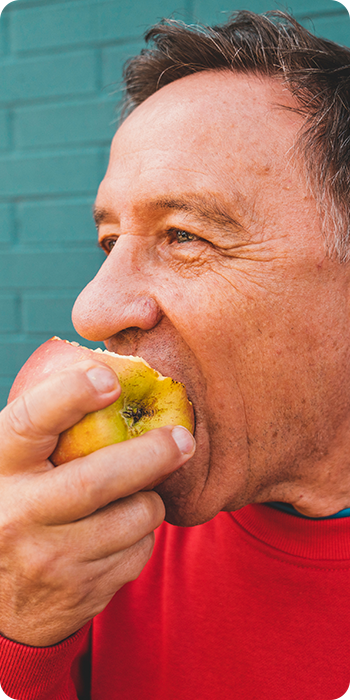 man eating an apple